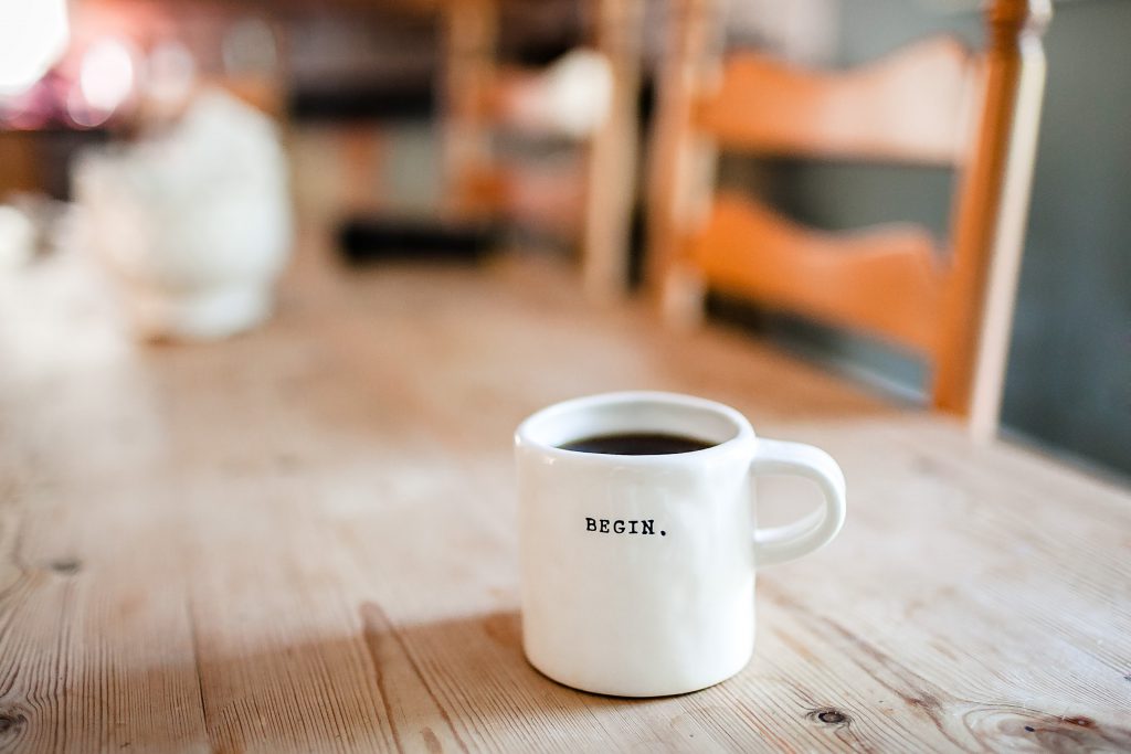 Coffee mug with the words "Begin"